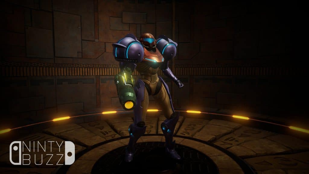 Samus in her Gravity Suit waiting inside an ornate elevator shaft as she travels to her next destination.